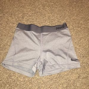 Gray Nike Pro athletic shorts